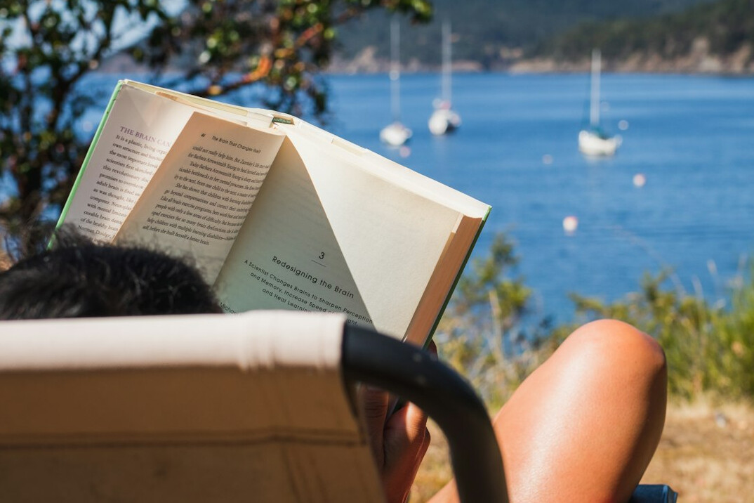 person reading mystery book